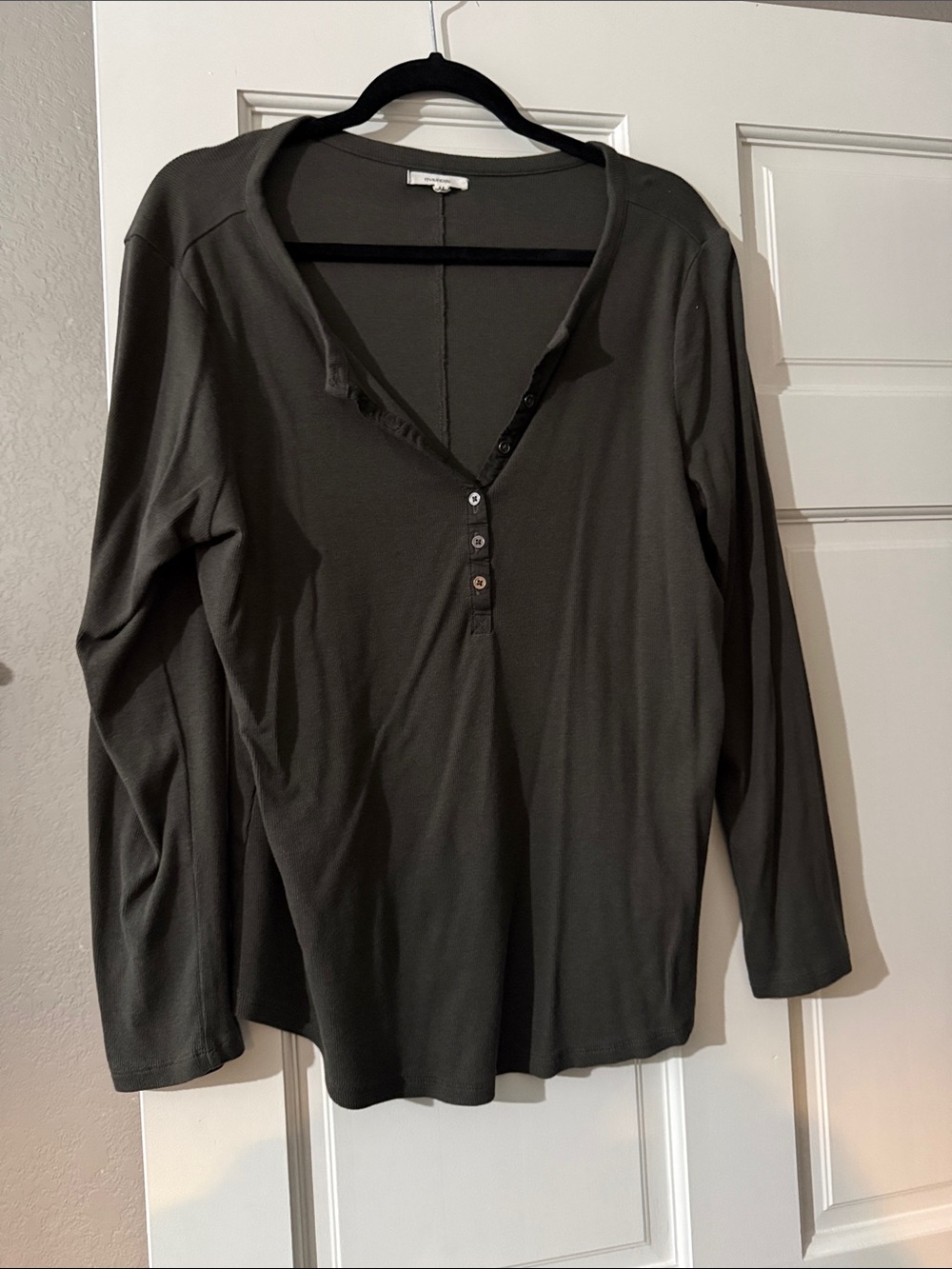Maurice’s button down.